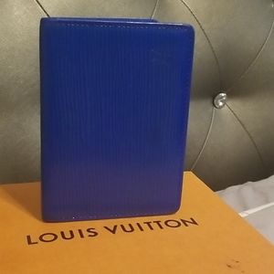 Authentic Louis Vuitton epi card holder with box.